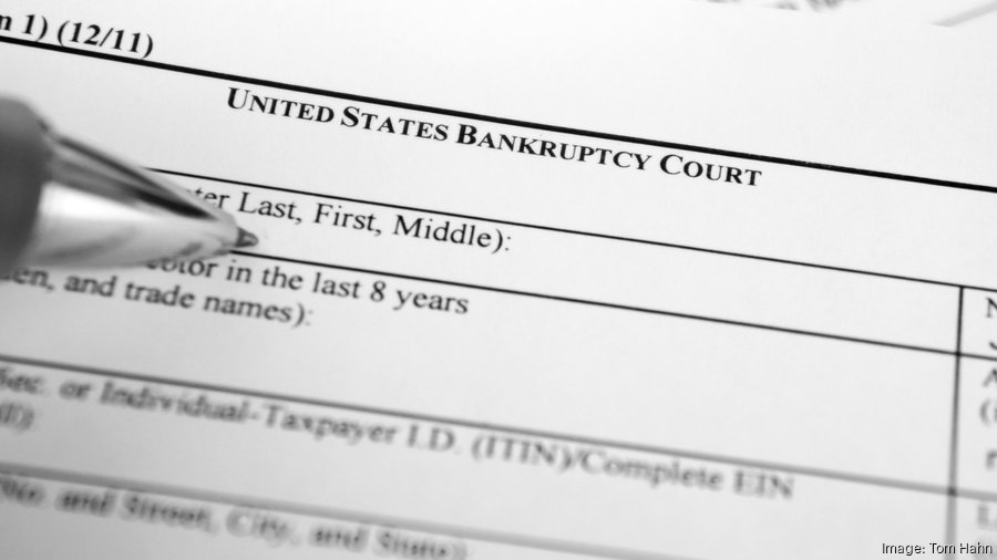 Navigating Chapter 11 Bankruptcy for HVAC Companies Image Description: A black and white photo featuring a "United States Bankruptcy Court" form for Chapter 11. A pen highlights the name section, symbolizing challenges faced by HVAC businesses, akin to those encountered by Air Pros.