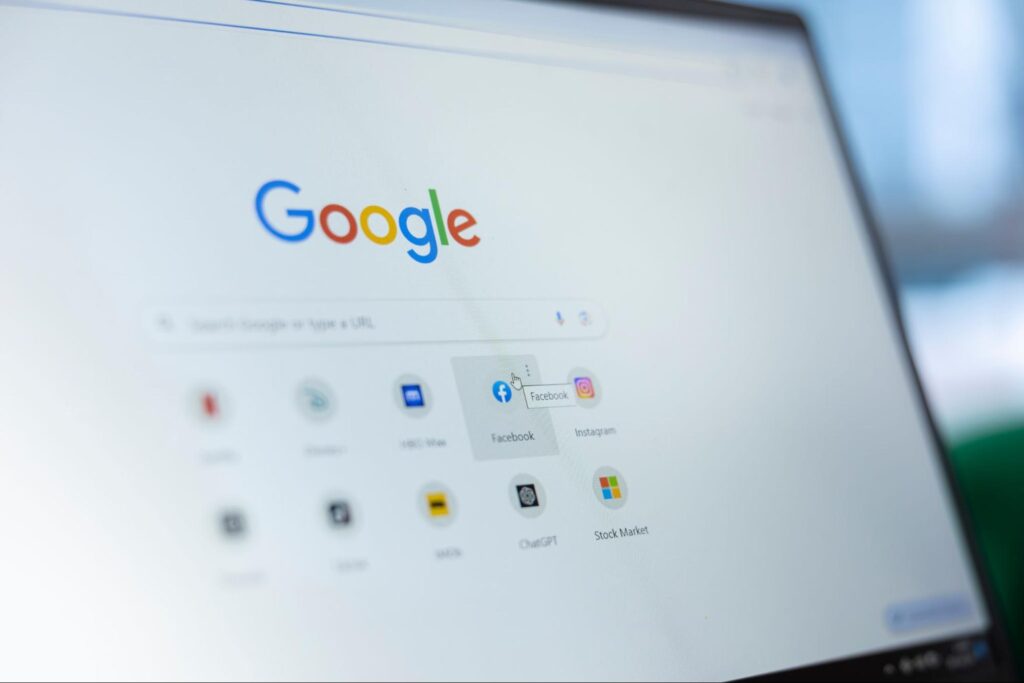 Computer screen on Google homepage, cursor hovers over Facebook shortcut—showing how home service brands can boost Google rankings.