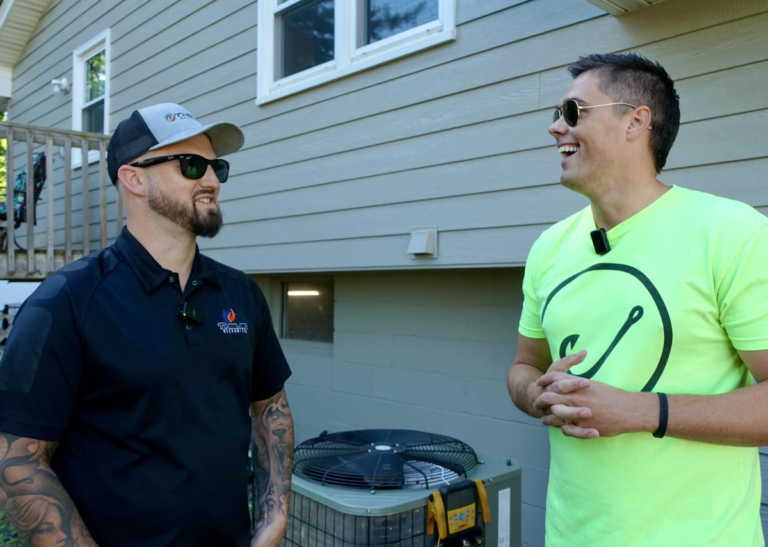 owner of Hook Agency next to client talking about lead generation strategies, how to get more leads from google through SEO, PPC, and effective website design, hvac guest posting for seo