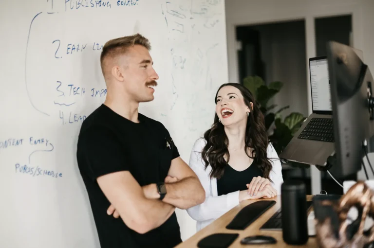 Maggie and Cody, two key team members at Hook Agency, sharing a friendly conversation and laughter, showcasing the exceptional customer service that the agency is known for. Their approachable, client-focused approach reflects Hook Agency’s commitment to building strong relationships with home service businesses. From HVAC to plumbing, the agency’s expert team ensures a seamless experience while delivering effective marketing strategies, custom website design, and lead generation solutions, setting the bar for customer satisfaction in the home services industry.